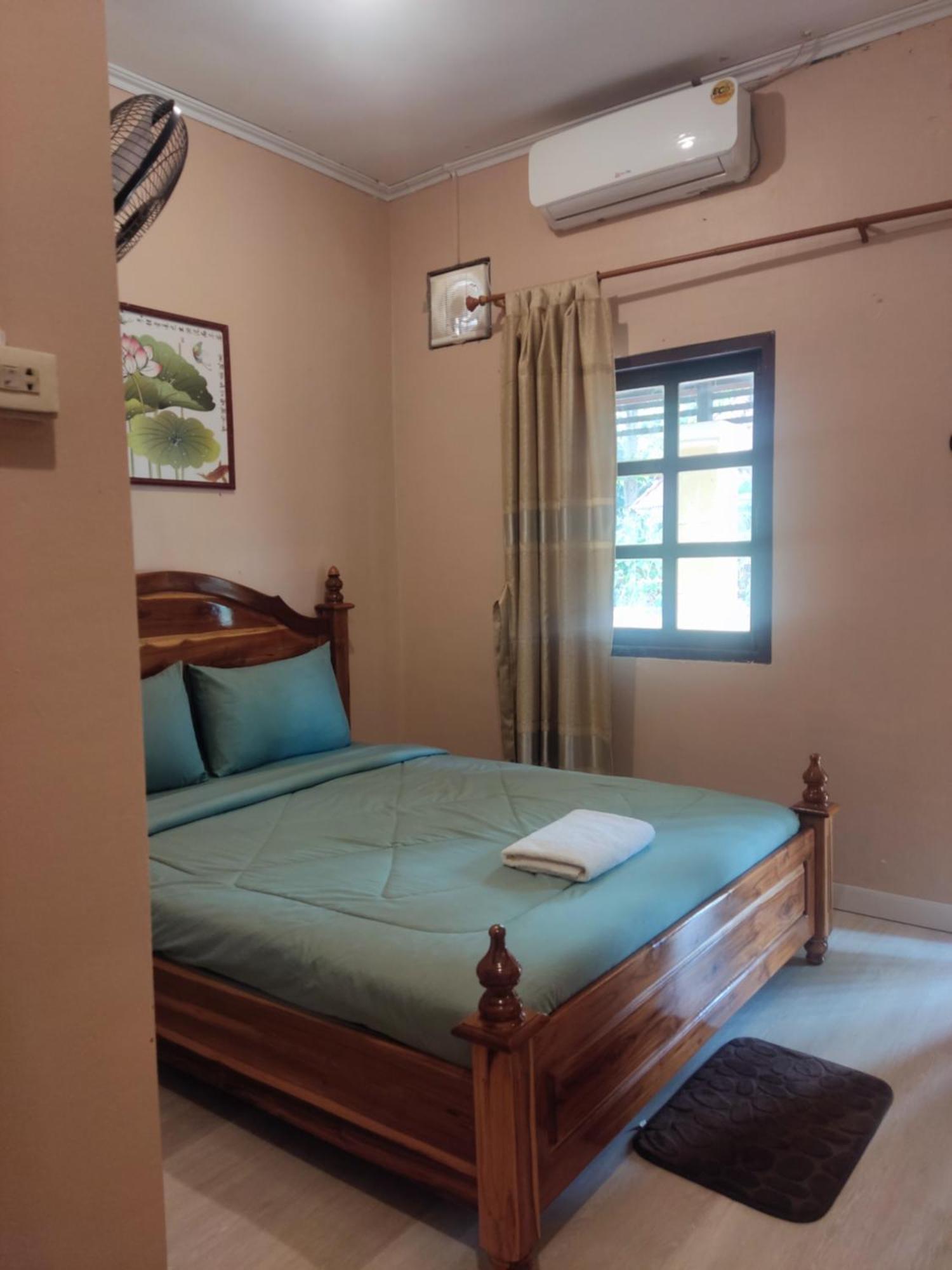 Erawan Guesthouse ปากเซ ภายนอก รูปภาพ
