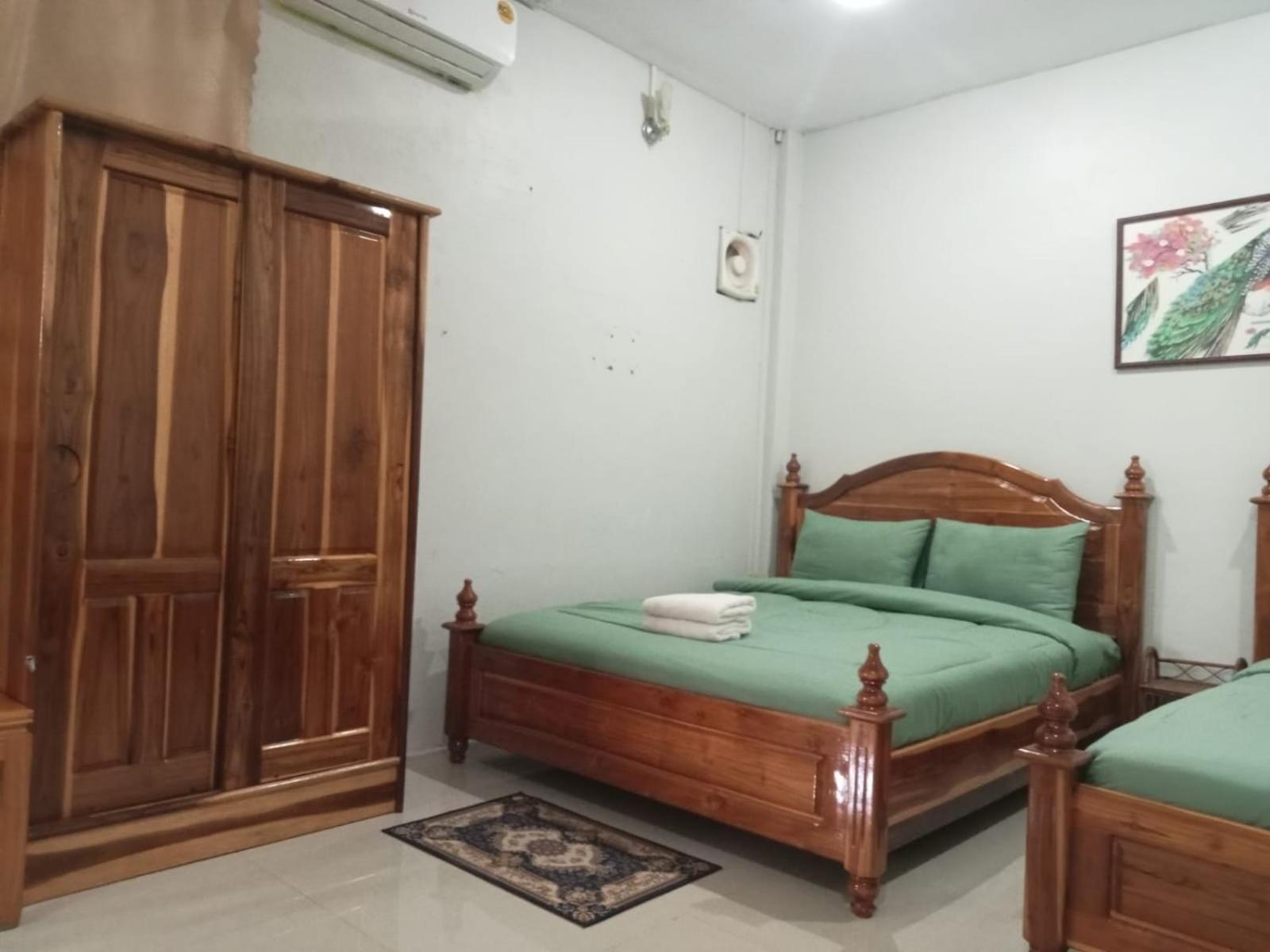 Erawan Guesthouse ปากเซ ภายนอก รูปภาพ
